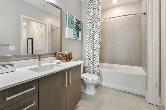 Bathroom with large vanity and large tub