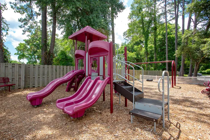 Outdoor playground with slides and swings