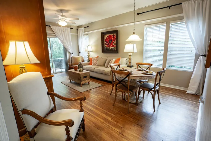 Furnished living and dining room with vinyl flooring