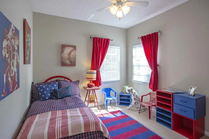 guest bedroom decorated in kids american baseball theme