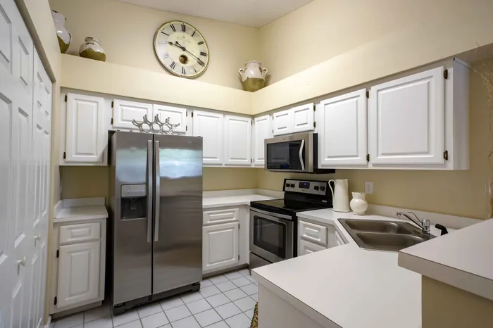 kitchen with white cabinets and stainless steel appliances