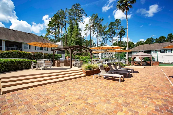 pool deck with lounge chairs