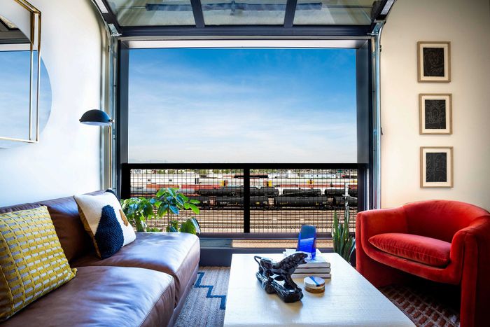 living area facing balcony with view