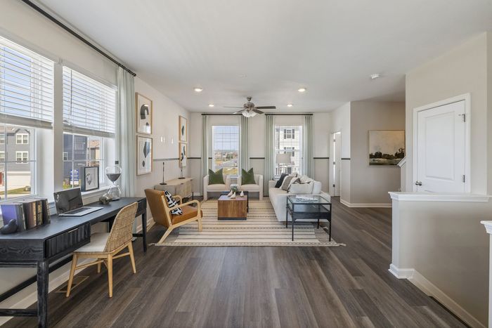 furnished kitchen and living area of townhome