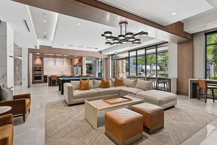 indoor clubroom with seating and pool table