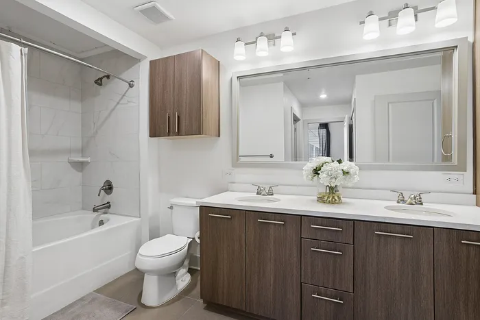 upgraded appliances and wood cabinets