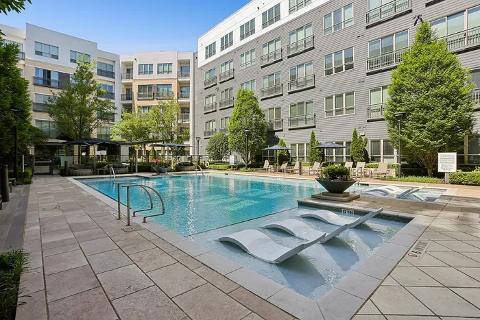 outdoor pool with seating