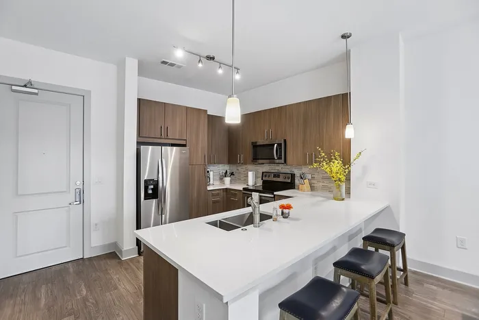 Modeled kitchen with barstools