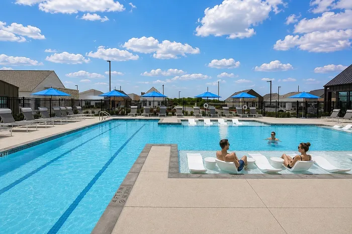 people sitting at pool