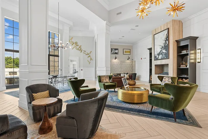 clubhouse lounge with tall ceilings and chairs