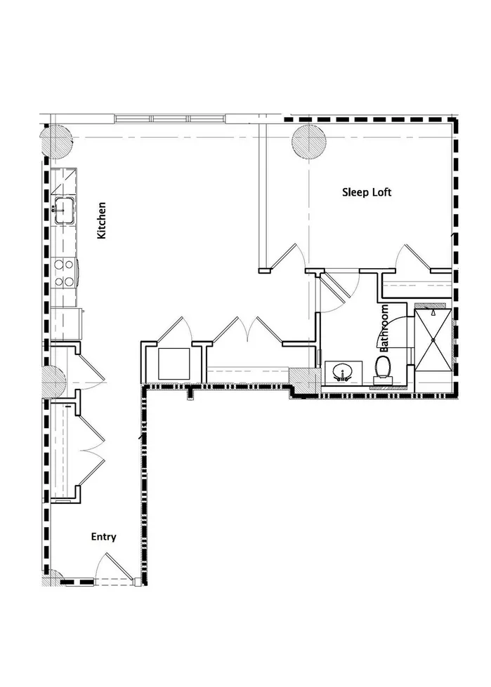 Chic modern floor plan showcasing a spacious sleep loft, well-equipped kitchen, and convenient bathroom layout.