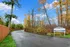 Enter Edgemont through a private drive with untouched wetlands