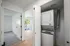 Hallway with laundry closet.