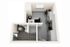Modern L-shaped studio apartment featuring an open kitchen with sleek appliances, spacious bedroom area, and chic bathroom with contemporary fixtures.