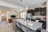 furnished kitchen and living area in townhome