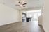 unfurnished living and kitchen areas in townhome