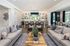 furnished clubroom area and kitchen with seating