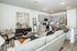 furnished kitchen and living area of home