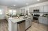furnished kitchen with island in home