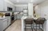 furnished kitchen with island in home