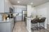 furnished kitchen with island in home