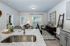 furnished kitchen with island in home