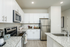 furnished kitchen area of home