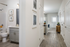 furnished hallway and bathroom