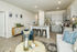 furnished kitchen and living area of home