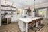 Furnished kitchen with seating and island