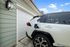 exterior sunny day vehicles parked in drive way