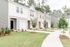 Exterior of townhome buildings with landscaping in front