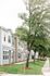 Exterior of townhome buildings with landscaping in front