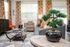 Furnished living area with vinyl plank flooring and lots of natural light