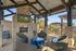 Covered Pavilion with Outdoor Seating, Fireplace, and TV for Entertainment