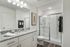 On-Suite Bathroom with Glass Shower and Vanity