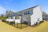 Exterior view of townhome with fenced backyard in Spartanburg, South Carolina