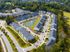 Aerial shot of the townhomes with lake in the middle