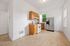 Bright and inviting kitchen with modern appliances, ample cabinetry, and large windows for natural light.