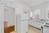 Bright and airy kitchen with modern appliances, ample counter space, and natural light.