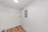 Spacious laundry room with modern hookups and elegant flooring, providing convenience and style in any home.