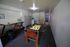 Chic recreational area with a foosball table, modern mailboxes, and laundry facilities, perfect for relaxation and convenience.