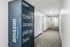 Modern apartment hallway featuring a convenient Amazon locker for secure and easy package pickup.