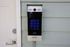 Secure apartment entry system featuring a modern keypad and access control for enhanced safety.