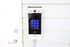 Modern access control keypad with a sleek design, offering secure entry in a stylish building.