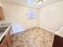 Bright and inviting kitchen with new granite countertops and tile flooring, perfect for cooking and entertaining.
