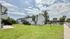 Charming apartment complex with modern architecture and lush green surroundings, perfect for comfortable living.