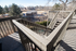 Inviting staircase with scenic views of lush park and sports fields, perfect for enjoying outdoor ambiance.