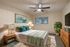 Inviting bedroom with a cozy bed, stylish decor, and soft lighting, perfect for relaxation.
