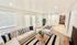 Bright and inviting living room with stylish decor, cozy seating, and a modern design, perfect for relaxation and entertainment.